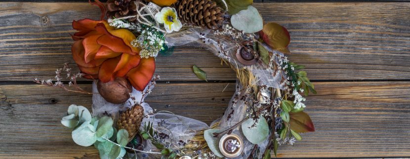 autumn wreath on wooden background in the form of a circle